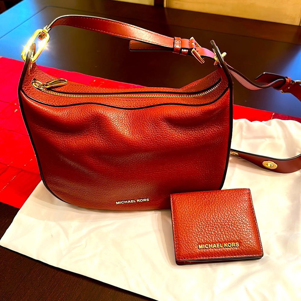 Leather bag with wallet included.  Items purchased separately but sold together.